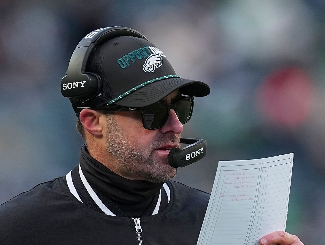 Philadelphia Eagles offensive coordinator Kevin Patullo looks at his play sheet against the Las Vegas Raiders at Lincoln Financial Field on Dec. 14, 2025, in Philadelphia. (Mitchell Leff/Getty Images)
